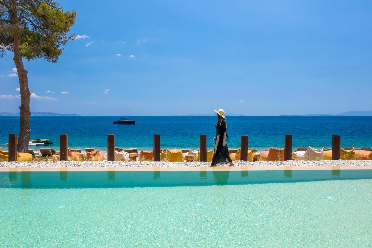 Isla Brown Corinthia Resort & Spa, Curio Collection By Hilton Agioi Theodoroi Esterno foto The beach at the hotel