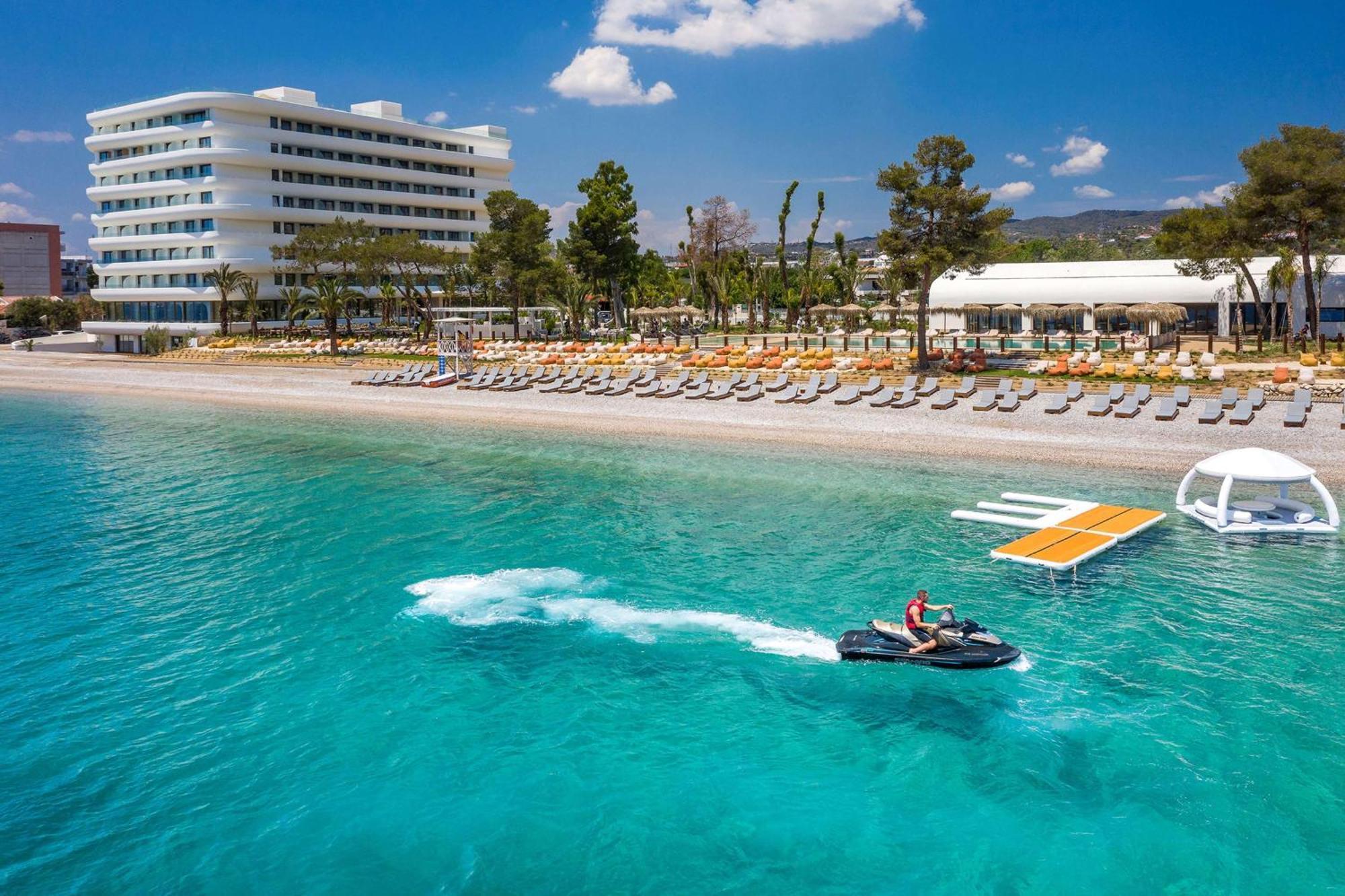 Isla Brown Corinthia Resort & Spa, Curio Collection By Hilton Agioi Theodoroi Esterno foto The resort's beach