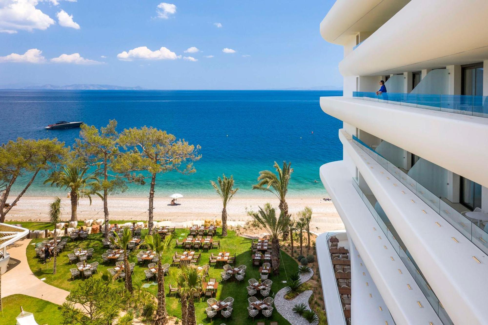 Isla Brown Corinthia Resort & Spa, Curio Collection By Hilton Agioi Theodoroi Esterno foto View of the beach from the hotel
