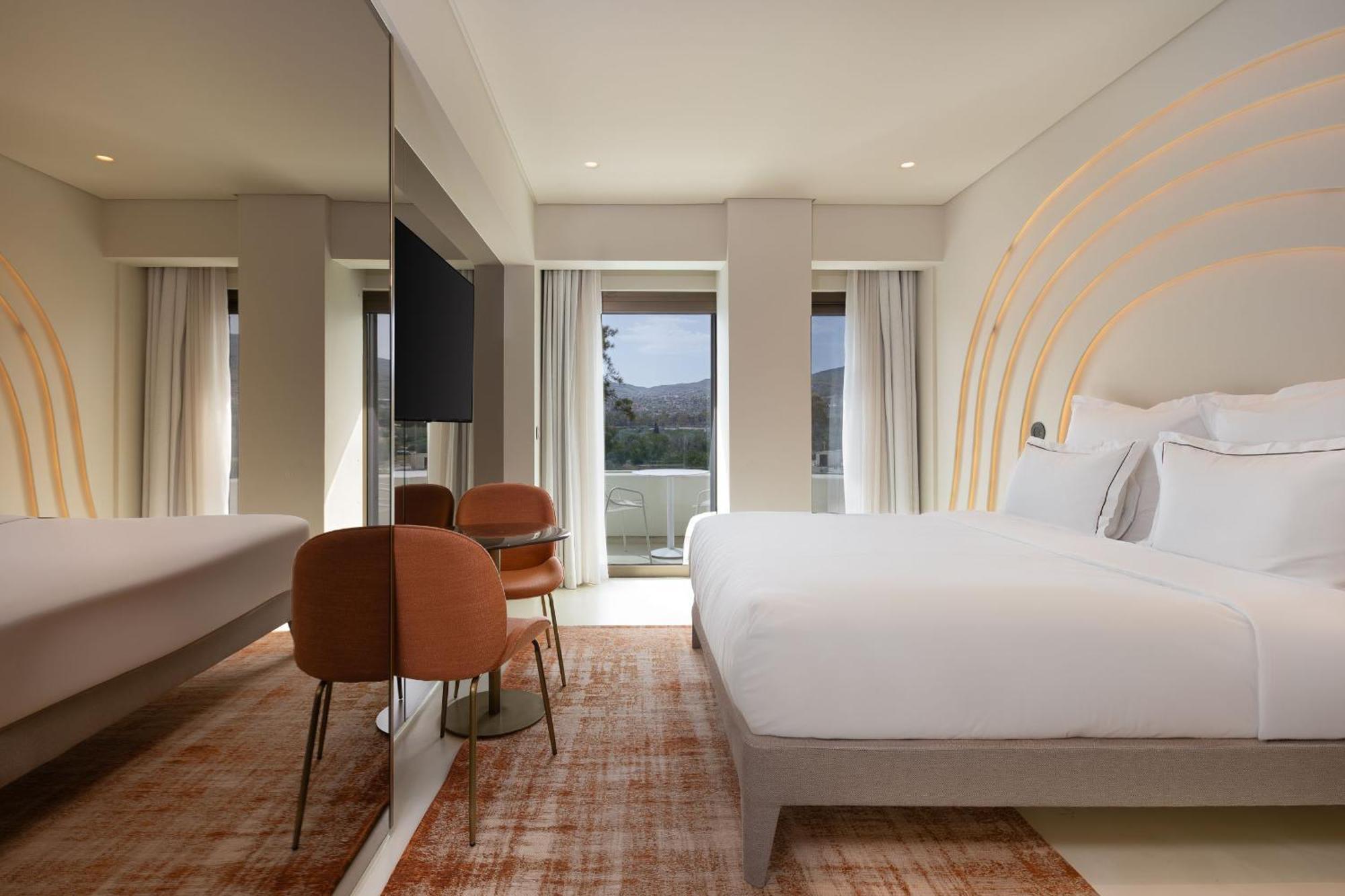 Isla Brown Corinthia Resort & Spa, Curio Collection By Hilton Agioi Theodoroi Camera foto A room at the hotel