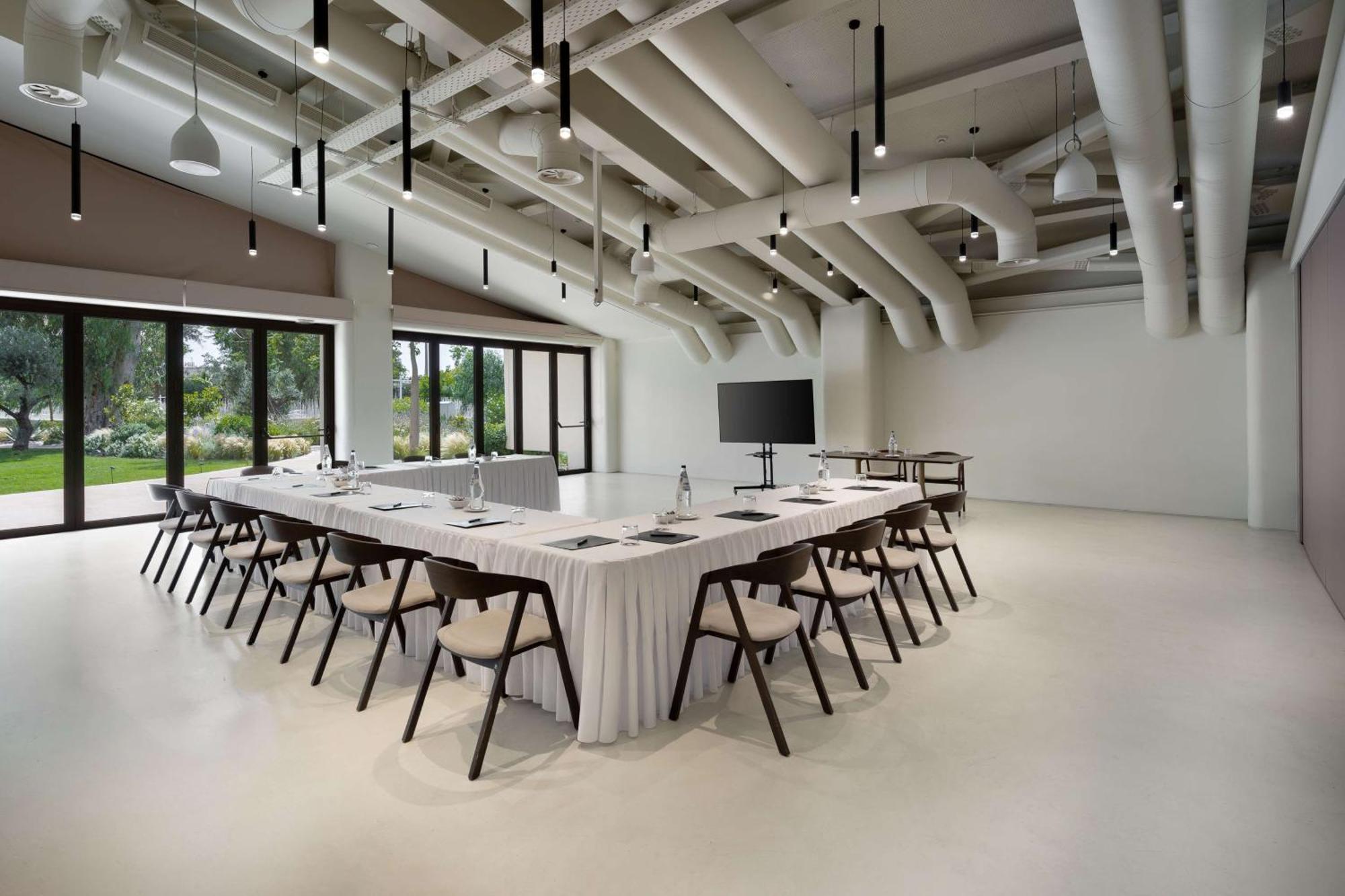 Isla Brown Corinthia Resort & Spa, Curio Collection By Hilton Agioi Theodoroi Esterno foto The meeting room
